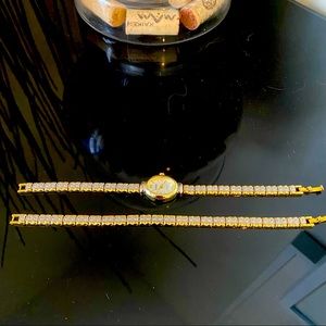 Gitano Women’s gold tone watch set.